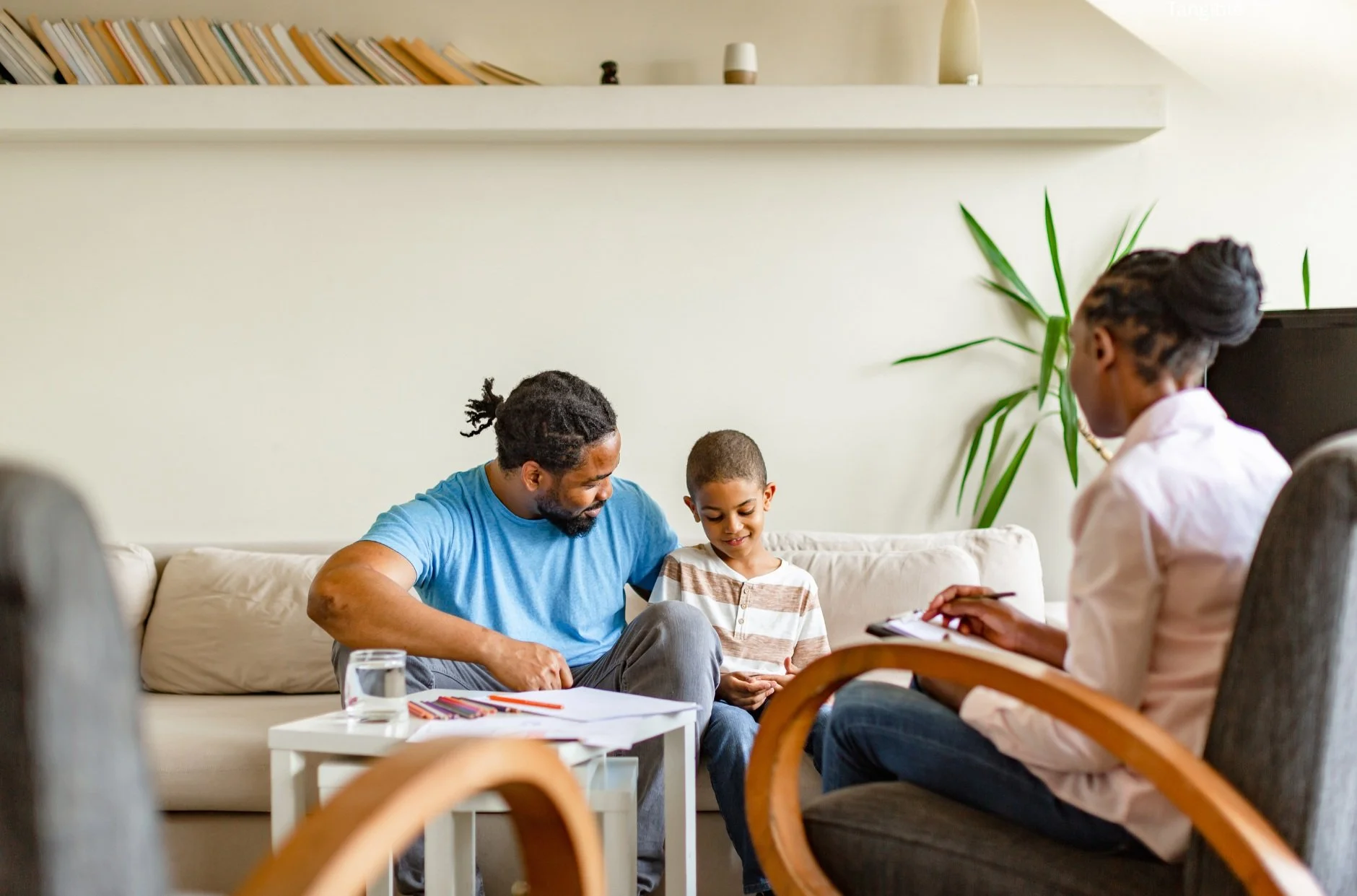 Parent and child participating in ABA therapy session at home in Canada
