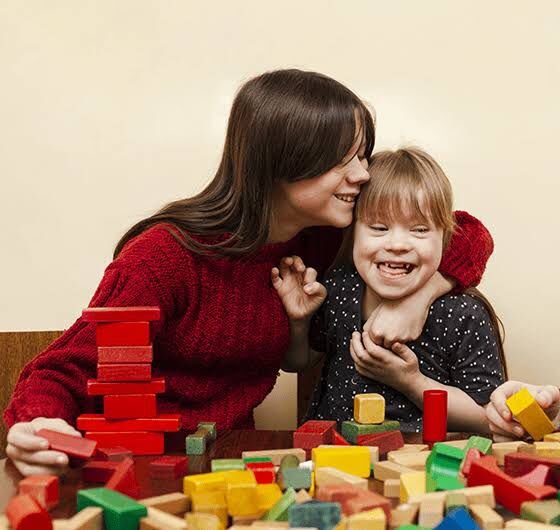 Canadian family reviewing financial documents for therapy funding