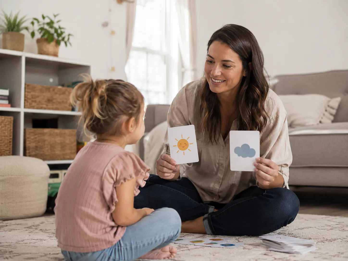 Certified ABA therapist working one-on-one with a child during an in-home therapy session in Kitchener