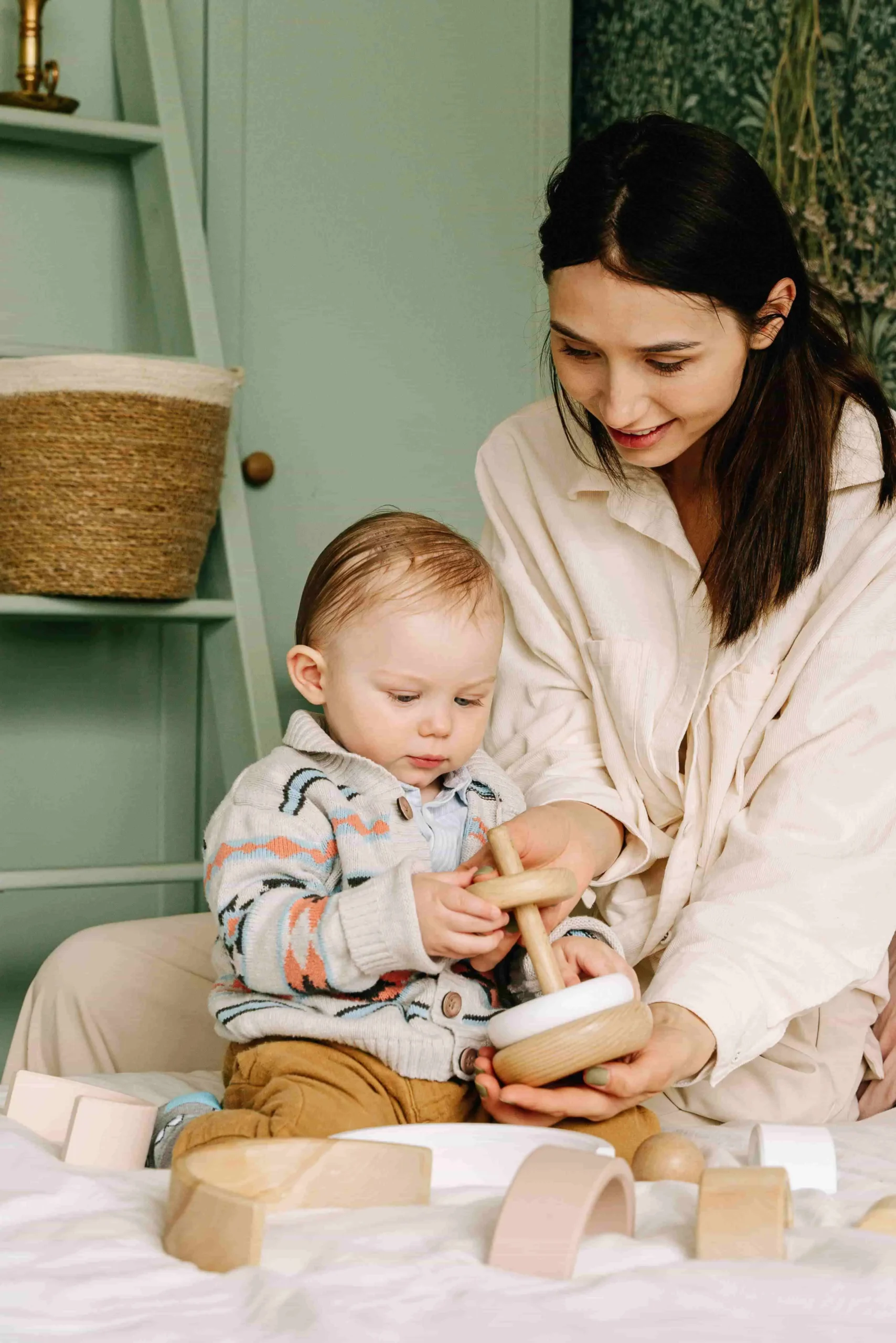 Certified ABA therapist working with a child during a therapy activity